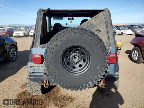 1998 Jeep Wrangler Sport with VIN 1J4FY19S2WP719595, listed as a Copart auction lot 73013584 with 190,056 mi miles and Salvage Title. Bid and sale history available at carsss.com. Image 6.