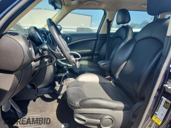 2015 MINI Countryman S with VIN WMWZC3C58FWT06647, listed as a Copart auction lot 63597265 with Not provided miles and Clean title. Bid and sale history available at DreamBid. Image 7.