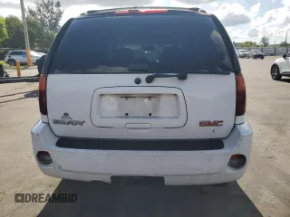 2005 GMC Envoy Denali z VIN 1GKES63MX52321416, wystawiony jako Copart lot #57587575 z przebiegiem 252 571 mil mil oraz Szkody całkowita. Historia ofert i sprzedaży dostępna na DreamBid. Obrazek 6.