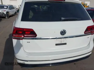 2018 Volkswagen Atlas SE z VIN 1V2FR2CA2JC540657, wystawiony jako IAAI lot #42115554 z przebiegiem 107 309 mil mil oraz . Historia ofert i sprzedaży dostępna na DreamBid. Obrazek 16.