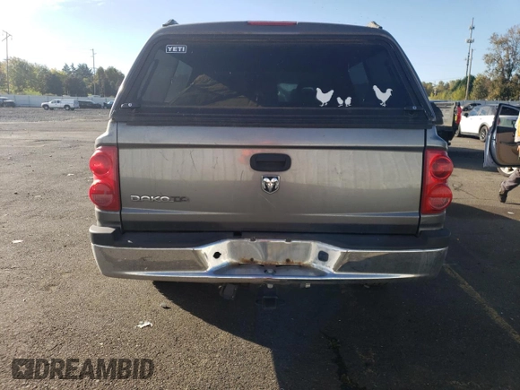 2006 Dodge Dakota ST with VIN 1D7HW28K96S716210, listed as a Copart auction lot 77416344 with 115,973 mi miles and Salvage Title. Bid and sale history available at DreamBid. Image 6.