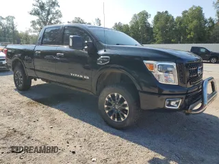 2018 Nissan Titan XD SV with VIN 1N6BA1F45JN528365, listed as a Copart auction lot 67958794 with 113,658 mi miles and Salvage Title. Bid and sale history available at carsss.com. Image 4.