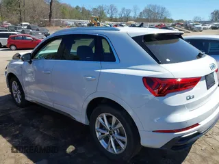 2022 Audi Q3 S line Premium Plus z VIN WA1EECF30N1126400, wystawiony jako IAAI lot #41822175 z przebiegiem 28 850 mil mil oraz . Historia ofert i sprzedaży dostępna na DreamBid. Obrazek 14.