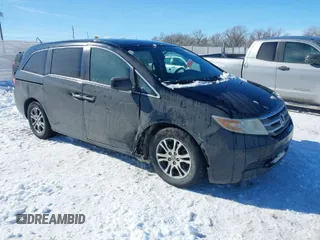 2011 Honda Odyssey EX with VIN 5FNRL5H41BB033760, listed as a IAAI auction lot 41583279 with 187,260 mi miles. Bid and sale history available at carsss.com. Image 1.