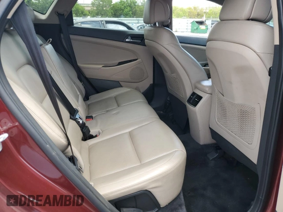 2016 Hyundai Tucson Limited z VIN KM8J33A25GU140802, wystawiony jako Copart lot #56249745 z przebiegiem 86 976 mil mil oraz Szkoda całkowita • Salvage title. Historia ofert i sprzedaży dostępna na DreamBid. Obrazek 11.