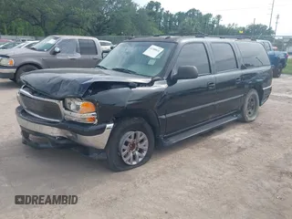 2003 GMC Yukon XL SLT z VIN 1GKEC16Z43J107189, wystawiony jako IAAI lot #42288816 z przebiegiem 312 532 mil mil oraz . Historia ofert i sprzedaży dostępna na DreamBid. Obrazek 2.