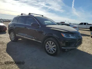 2016 Volkswagen Touareg Sport with VIN WVGEF9BP9GD010964, listed as a Copart auction lot 85800844 with 157,563 mi miles and Salvage Title. Bid and sale history available at DreamBid. Image 4.