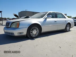 2003 Cadillac DeVille DHS z VIN 1G6KE54Y13U124690, wystawiony jako Copart lot #73757984 z przebiegiem 101 286 mil mil oraz Szkoda całkowita • Salvage title. Historia ofert i sprzedaży dostępna na DreamBid. Obrazek 1.