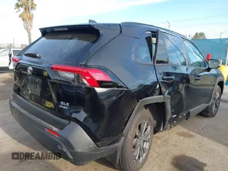 2025 Toyota RAV4 Hybrid XLE Premium with VIN 2T3B6RFV6SW084676, listed as a IAAI auction lot 41923759 with 15,856 mi miles and . Bid and sale history available at DreamBid. Image 4.