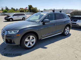2018 Audi Q5 Premium Plus with VIN WA1BNAFY8J2008943, listed as a Copart auction lot 63233705 with 100,879 mi miles and Salvage title. Bid and sale history available at DreamBid. Image 1.