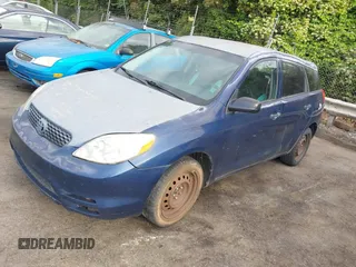 2003 Toyota Matrix Std with VIN 2T1KR32EX3C012210, listed as a IAAI auction lot 42152686 with 299,999 mi miles. Bid and sale history available at carsss.com. Image 2.