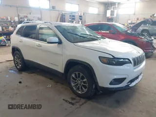2020 Jeep Cherokee Altitude with VIN 1C4PJMLN6LD647106, listed as a IAAI auction lot 41406440 with 58,788 mi miles. Bid and sale history available at carsss.com. Image 1.