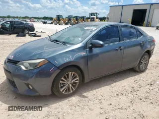 2014 Toyota Corolla L with VIN 5YFBURHE4EP005426, listed as a Copart auction lot 62304165 with 106,773 mi miles and Salvage title. Bid and sale history available at DreamBid. Image 1.