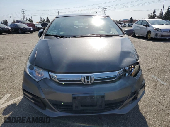 2012 Honda Insight EX z VIN JHMZE2H77CS002907, wystawiony jako Copart lot #52040465 z przebiegiem 158 266 mil mil oraz Szkoda całkowita • Salvage title. Historia ofert i sprzedaży dostępna na DreamBid. Obrazek 5.