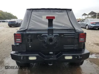 2008 Jeep Wrangler Unlimited Sahara with VIN 1J4GA59148L574934, listed as a Copart auction lot 74590164 with 134,674 mi miles and Salvage title. Bid and sale history available at DreamBid. Image 6.