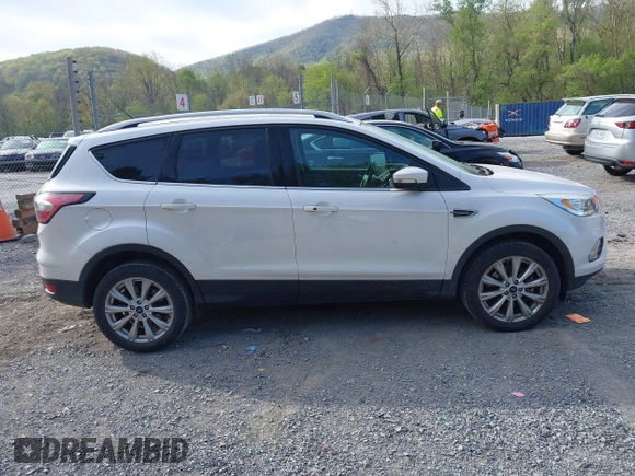 2017 Ford Escape Titanium with VIN 1FMCU9JD9HUB40135, listed as a IAAI auction lot 42054533 with 68,255 mi miles. Bid and sale history available at carsss.com. Image 13.