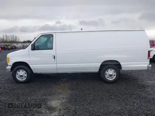 1996 Ford Econoline Cargo with VIN 1FTJS34H4THA69893, listed as a IAAI auction lot 41703257 with 206,503 mi miles and . Bid and sale history available at DreamBid. Image 14.