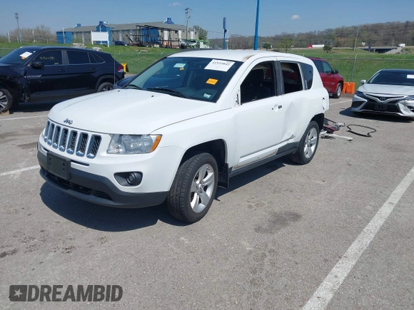 2011 Jeep Compass Latitude with VIN 1J4NT1FB2BD236439, listed as a IAAI auction lot 41935842 with 164,893 mi miles. Bid and sale history available at carsss.com. Image 19.