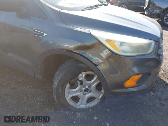 2017 Ford Escape S z VIN 1FMCU0F75HUD15558, wystawiony jako IAAI lot #41890712 z przebiegiem 158 441 mil mil oraz . Historia ofert i sprzedaży dostępna na DreamBid. Obrazek 6.