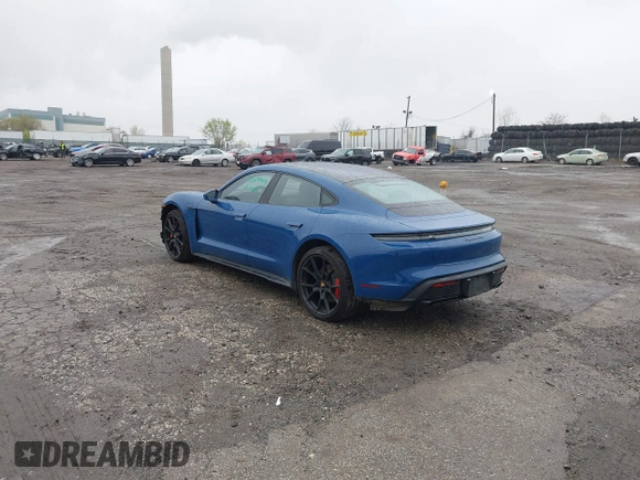 2022 Porsche Taycan GTS z VIN WP0AD2Y17NSA59692, wystawiony jako IAAI lot #41961572 z przebiegiem 12 680 mil mil oraz . Historia ofert i sprzedaży dostępna na DreamBid. Obrazek 3.