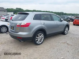 2012 Mazda CX-9 Grand Touring z VIN JM3TB3DV0C0367314, wystawiony jako IAAI lot #42680001 z przebiegiem 239 975 mil mil oraz . Historia ofert i sprzedaży dostępna na DreamBid. Obrazek 4.