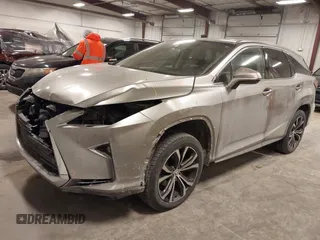 2018 Lexus RX 350L Premium z VIN JTJDZKCA6J2004385, wystawiony jako IAAI lot #41382429 z przebiegiem 111 638 mil mil oraz . Historia ofert i sprzedaży dostępna na DreamBid. Obrazek 2.