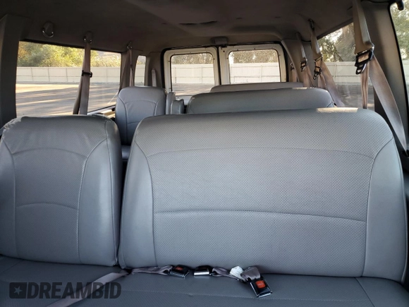 2000 Ford Econoline Passenger XL with VIN 1FBSS31L3YHB98619, listed as a Copart auction lot 77615904 with 316,815 mi miles and Clean Title. Bid and sale history available at DreamBid. Image 10.