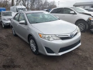 2014 Toyota Camry Hybrid LE with VIN 4T1BD1FK4EU101338, listed as a IAAI auction lot 41664113 with 238,636 mi miles. Bid and sale history available at carsss.com. Image 1.