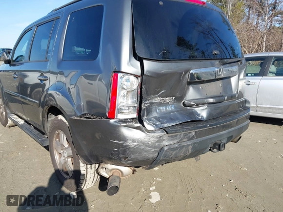 2011 Honda Pilot EX-L with VIN 5FNYF3H66BB018616, listed as a IAAI auction lot 41449001 with 221,499 mi miles and . Bid and sale history available at DreamBid. Image 6.