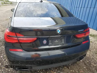 2019 BMW 7 Series 740i with VIN WBA7E2C57KB217455, listed as a Copart auction lot 69580773 with 74,717 mi miles and . Bid and sale history available at DreamBid. Image 6.