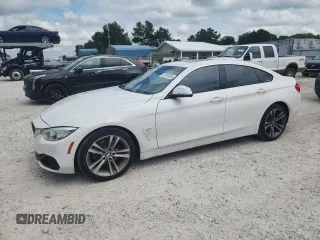 2016 BMW 4 Series 428i with VIN WBA4A9C59GG695667, listed as a Copart auction lot 58793095 with 105,019 mi miles and Salvage title. Bid and sale history available at DreamBid. Image 1.