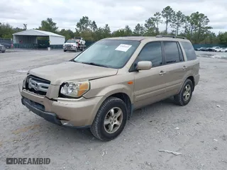 2006 Honda Pilot EX-L with VIN 5FNYF28566B010295, listed as a IAAI auction lot 41654433 with 302,539 mi miles. Bid and sale history available at carsss.com. Image 17.