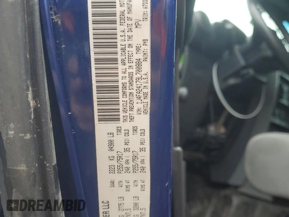 2009 Jeep Wrangler X with VIN 1J4FA24179L700884, listed as a Copart auction lot 52194055 with 96,189 mi miles and Salvage Title. Bid and sale history available at DreamBid. Image 13.