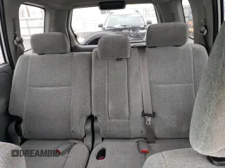2005 Suzuki XL7 LX z VIN JS3TX92V054108383, wystawiony jako Copart lot #85280414 z przebiegiem 128 594 mil mil oraz Szkoda całkowita • Salvage title. Historia ofert i sprzedaży dostępna na DreamBid. Obrazek 10.