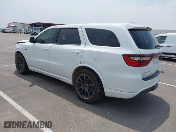 2018 Dodge Durango SRT with VIN 1C4SDJGJ2JC434843, listed as a IAAI auction lot 42434327 with 144,483 mi miles and . Bid and sale history available at DreamBid. Image 3.