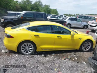 2016 Tesla Model S 70 kWh Battery with VIN 5YJSA1E14GF141579, listed as a IAAI auction lot 42209119 with 105,947 mi miles and . Bid and sale history available at carsss.com. Image 12.