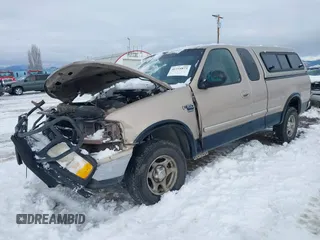 1998 Ford F-150 z VIN 1FTZX18W5WKB97701, wystawiony jako IAAI lot #41254873 z przebiegiem 291 523 mil mil oraz . Historia ofert i sprzedaży dostępna na DreamBid. Obrazek 17.