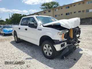 2019 Ford F-150 XL with VIN 1FTEW1C44KFA19563, listed as a Copart auction lot 52402655 with 147,071 mi miles and Non Repairable. Bid and sale history available at DreamBid. Image 4.