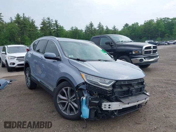 2021 Honda CR-V Touring with VIN 7FART6H91ME022993, listed as a IAAI auction lot 42439344 with 30,477 mi miles and . Bid and sale history available at DreamBid. Image 1.