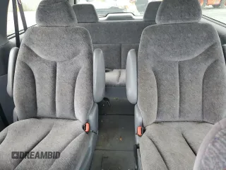 1999 Plymouth Voyager Grand SE z VIN 1P4GP44G7XB831207, wystawiony jako Copart lot #79558714 z przebiegiem 163 620 mil mil oraz Szkody całkowita. Historia ofert i sprzedaży dostępna na DreamBid. Obrazek 10.