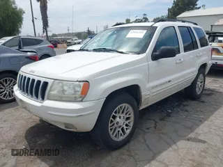 2002 Jeep Grand Cherokee Limited with VIN 1J4GX58S52C305020, listed as a IAAI auction lot 42025324 with 214,214 mi miles and . Bid and sale history available at DreamBid. Image 2.