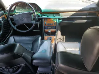 1990 Mercedes-Benz 420 with VIN WDBCA35E6LA549912, listed as a Copart auction lot 69108464 with 302,188 mi miles and Salvage Title. Bid and sale history available at carsss.com. Image 8.