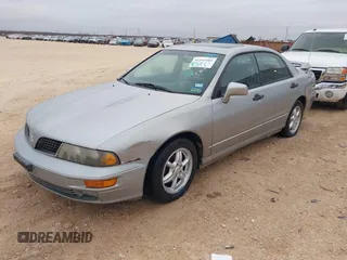 2002 Mitsubishi Diamante z VIN 6MMAP87P82T022689, wystawiony jako IAAI lot #41193483 z przebiegiem 107 022 mil mil oraz . Historia ofert i sprzedaży dostępna na DreamBid. Obrazek 2.