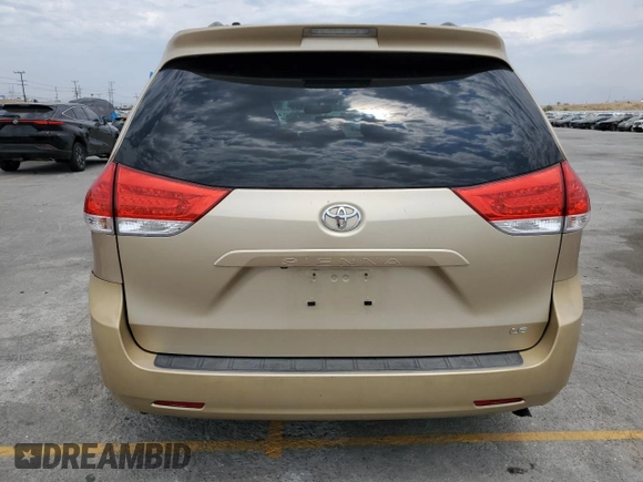 2012 Toyota Sienna LE AAS with VIN 5TDKK3DC5CS227808, listed as a Copart auction lot 57984515 with 103,656 mi miles and Salvage title. Bid and sale history available at DreamBid. Image 6.