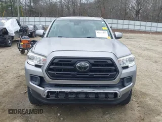 2018 Toyota Tacoma SR with VIN 3TMCZ5AN4JM130307, listed as a IAAI auction lot 41541477 with 74,369 mi miles and . Bid and sale history available at DreamBid. Image 13.