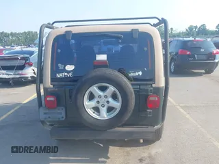2002 Jeep Wrangler X with VIN 1J4FA39S72P733034, listed as a IAAI auction lot 42659447 with 200,786 mi miles and . Bid and sale history available at DreamBid. Image 16.