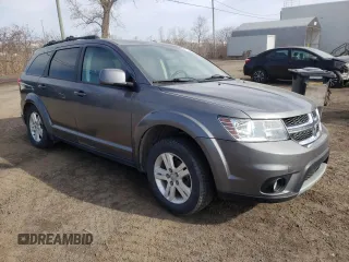 2012 Dodge Journey SXT z VIN 3C4PDCCGXCT177675, wystawiony jako Copart lot #52396045 z przebiegiem 168 203 mil mil oraz Szkoda całkowita • Salvage title. Historia ofert i sprzedaży dostępna na DreamBid. Obrazek 4.