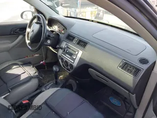 2005 Ford Focus S with VIN 3FAFP37N35R123622, listed as a IAAI auction lot 41778241 with 176,611 mi miles and . Bid and sale history available at carsss.com. Image 5.