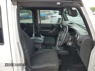2016 Jeep Wrangler Unlimited Sport RHD with VIN 1C4BJWKG6GL293429, listed as a Copart auction lot 59156585 with 226,276 mi miles and Salvage title. Bid and sale history available at DreamBid. Image 7.