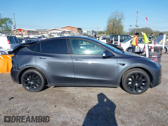 2021 Tesla Model Y Long Range with VIN 5YJYGAEE1MF149887, listed as a IAAI auction lot 42032104 with 54,932 mi miles. Bid and sale history available at carsss.com. Image 13.